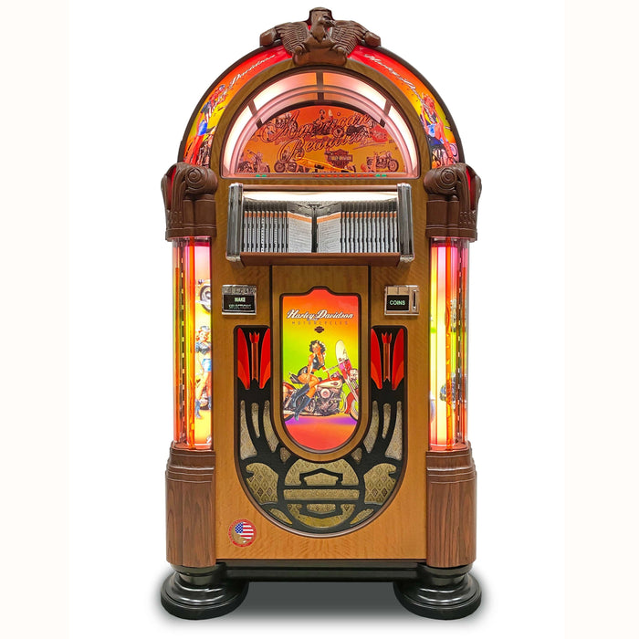 Rock-Ola American Beauties Bubbler 6-CD Jukebox Authentic and Handcrafted J-70403-A Model Classic Design Inspired by Wurlitzer 1015 Iconic Bubbler with Floating Bubble Tubes Choice of Cabinet Finishes: Light Oak, Walnut, Satin Black Optional Gloss Black and Gloss White Finishes Best Sound Quality in a New Jukebox Bluetooth Connectivity for Wireless Music Streaming Dual 3-Way Speaker System for Live Performance Reproduction Authentic Disc Loader for 1950s Vinyl Experience