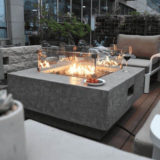 Elementi Manhattan High Performance Cast Concrete Fire Pit OFG103

Enhance your outdoor living experience with the best-selling Elementi Manhattan fire table. Designed to impress, this square-shaped fire table becomes the focal point as you gather with family and friends. Measuring at 36" in length, 36" wide, and 16" tall, it perfectly fits into your backyard oasis, adding a touch of sophistication.