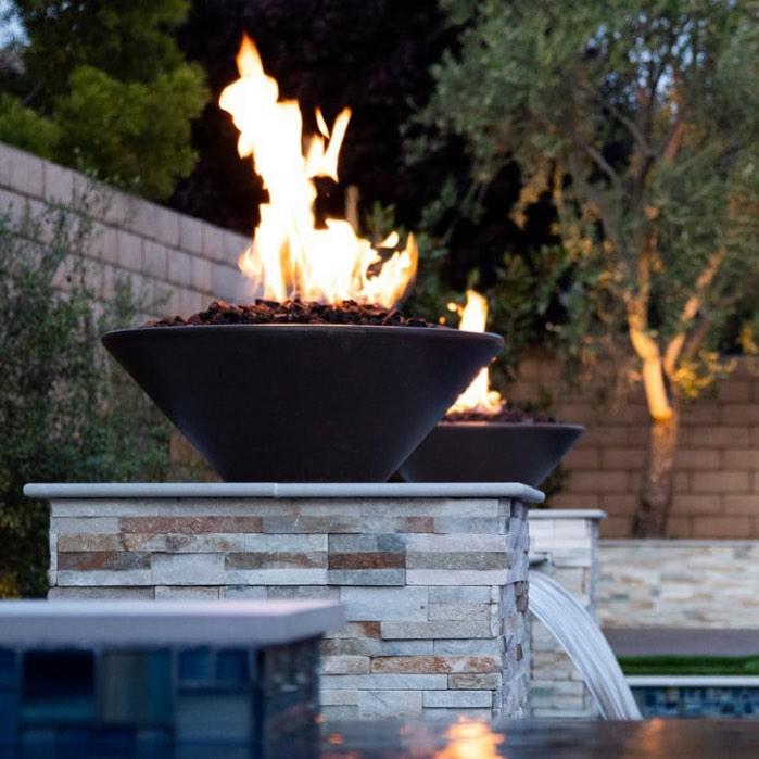Enhance your outdoor space with the Cazo Fire Bowl - GFRC Concrete, a stunning piece inspired by Spanish architecture. Handmade in the USA by The Outdoor Plus, this fire bowl combines durability and lightweight design. Elevate your outdoor ambiance with this exquisite addition.