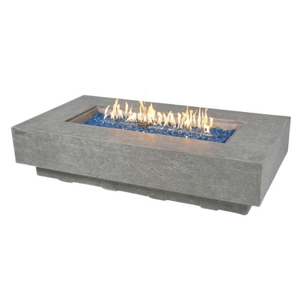Elementi Plus Positano & Riviera Modern Rectangle Fire Table OFG415LG. Durable, Lightweight, Beautiful The Elementi Plus Riviera’s top-of-the-line materials are what ensure its amazing performance. With a GFRC (Glass Fibre Reinforced Concrete) shell that ensures a solid build while still being incredibly lightweight. The 30”, 16 gauge, 304 Stainless Steel burner is placed in the middle of the table to keep the flames centralized atop the blue glass filling