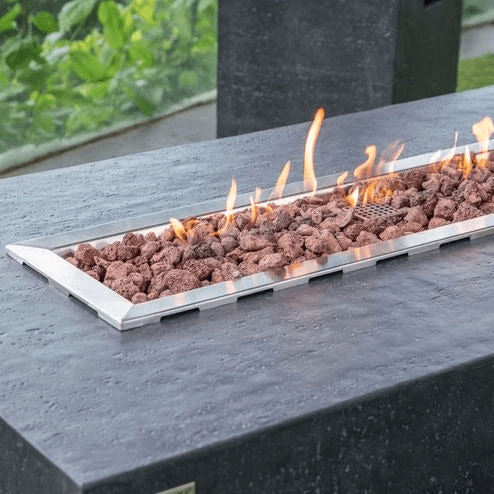 Elementi Hampton High Performance Cast Concrete Outdoor FirePit OFG139 Enhance your outdoor living space with the Elementi Hampton Fire Table, a modern and long-lasting addition that is sure to impress. Designed to withstand the test of time, this fire table offers both functionality and style at an affordable price. Featuring a robust heat output of 45,000 BTUs, the Hampton Fire Table ensures a cozy and inviting atmosphere for your outdoor gatherings.